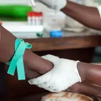 Drawing blood to test for HIV