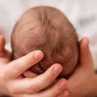 Baby in hands